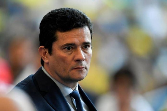 83568470_brazils-minister-of-justice-sergio-moro-waits-for-the-start-of-the-copa-america-footba